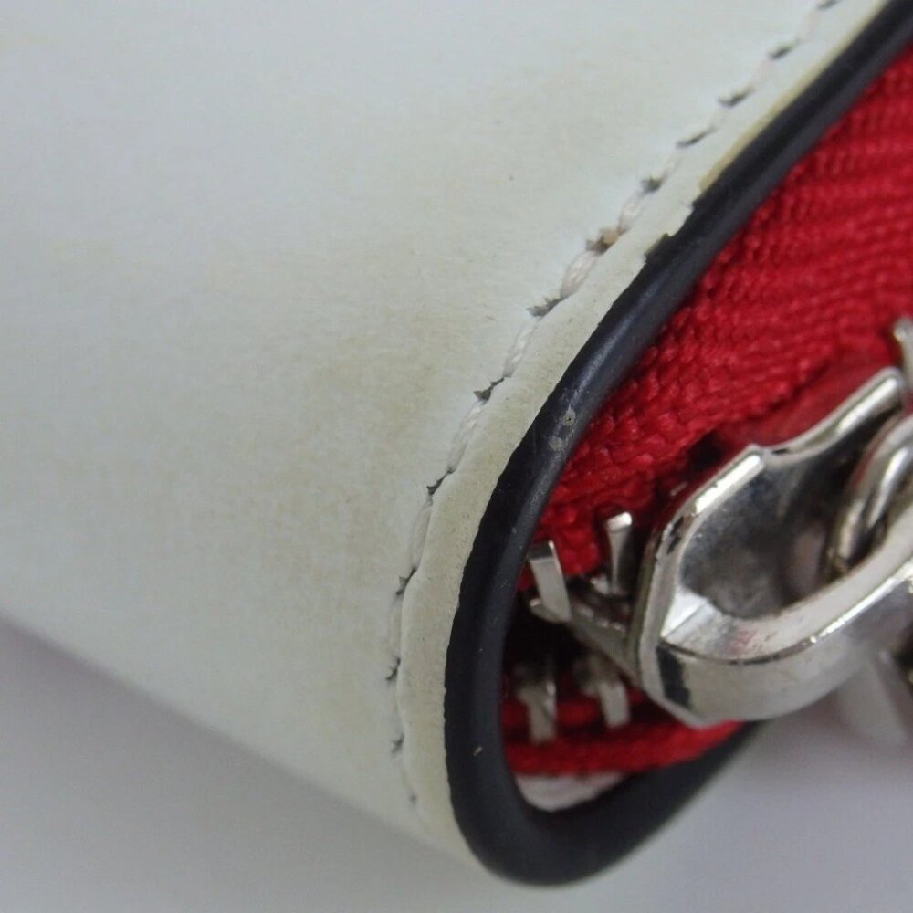 Authentic Christian Louboutin PANETTONE PARIS LOVE Zip Around purse PVC [Used] - Picture 11 of 16